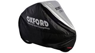 An Oxford bike cover fitted onto a bike, with a white background
