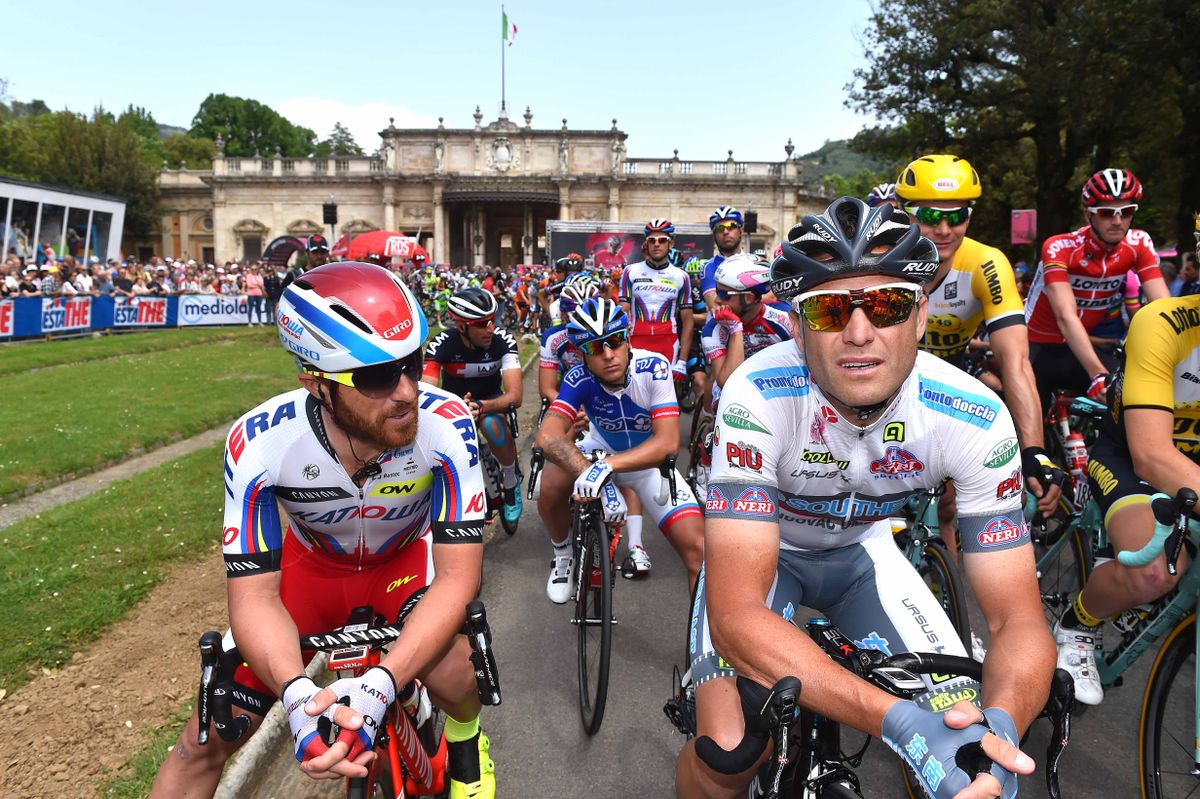 Luca Paolini and Alessandro Petacchi wait for the start