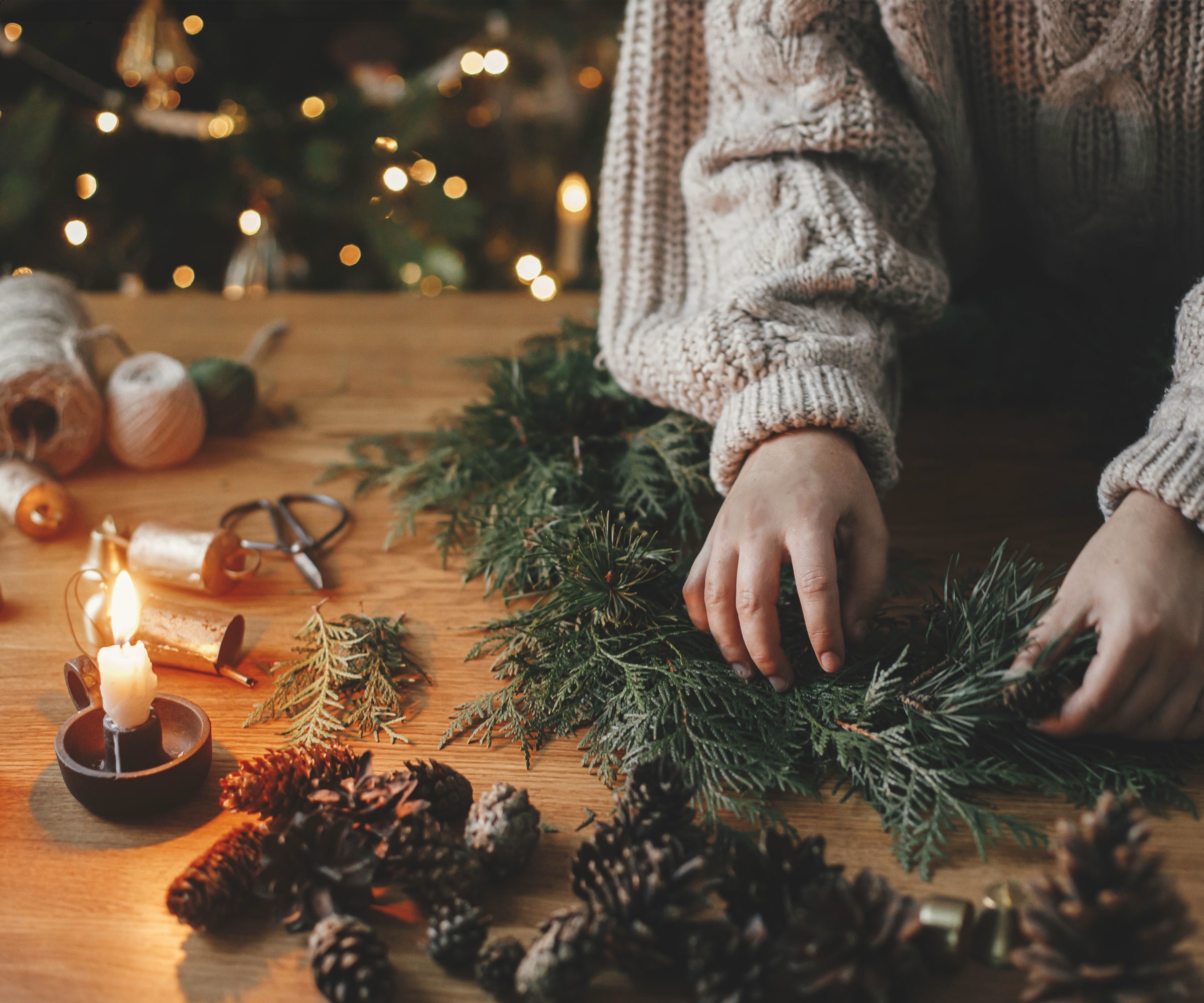 Christmas tree garland being made with tree and plant cuttings