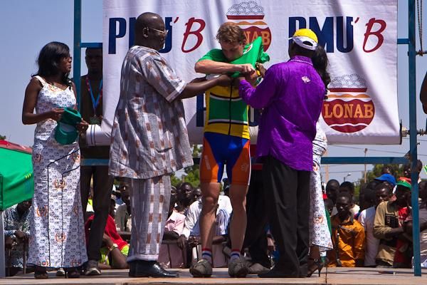 Van Agtmaal gets a little help putting on his third jersey of the day.jpg