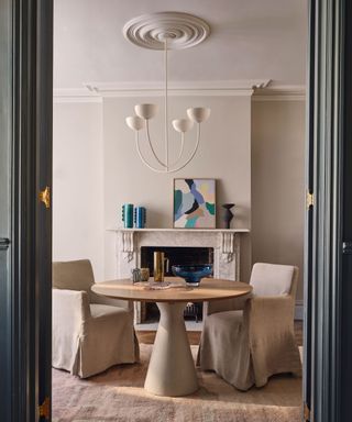 beige dining table and chairs