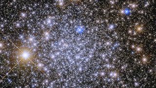 A Hubble Space Telescope image of the globular cluster Pismis 26 shows many thousands of stars from 23,000 light-years away.