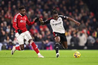 Calvin Bassey of Fulham and Divock Origi of Nottingham Forest during the Premier League match between Fulham FC and Nottingham Forest at Craven Cottage on December 6, 2023 in London, England. (Photo by Jacques Feeney/Offside/Offside via Getty Images)