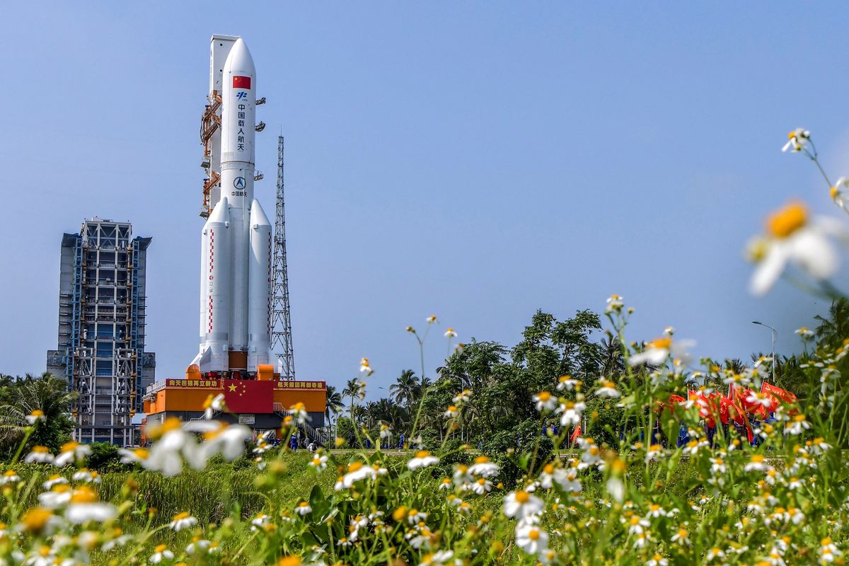 A Chinese Long March 5B rocket carrying the Tianhe space station core module rolls out to its launchpad at the Enchang Spacecraft Launch Site on Hainan Island in the southern Hainan province on April 23, 2021 ahead of a planned April 29 launch.