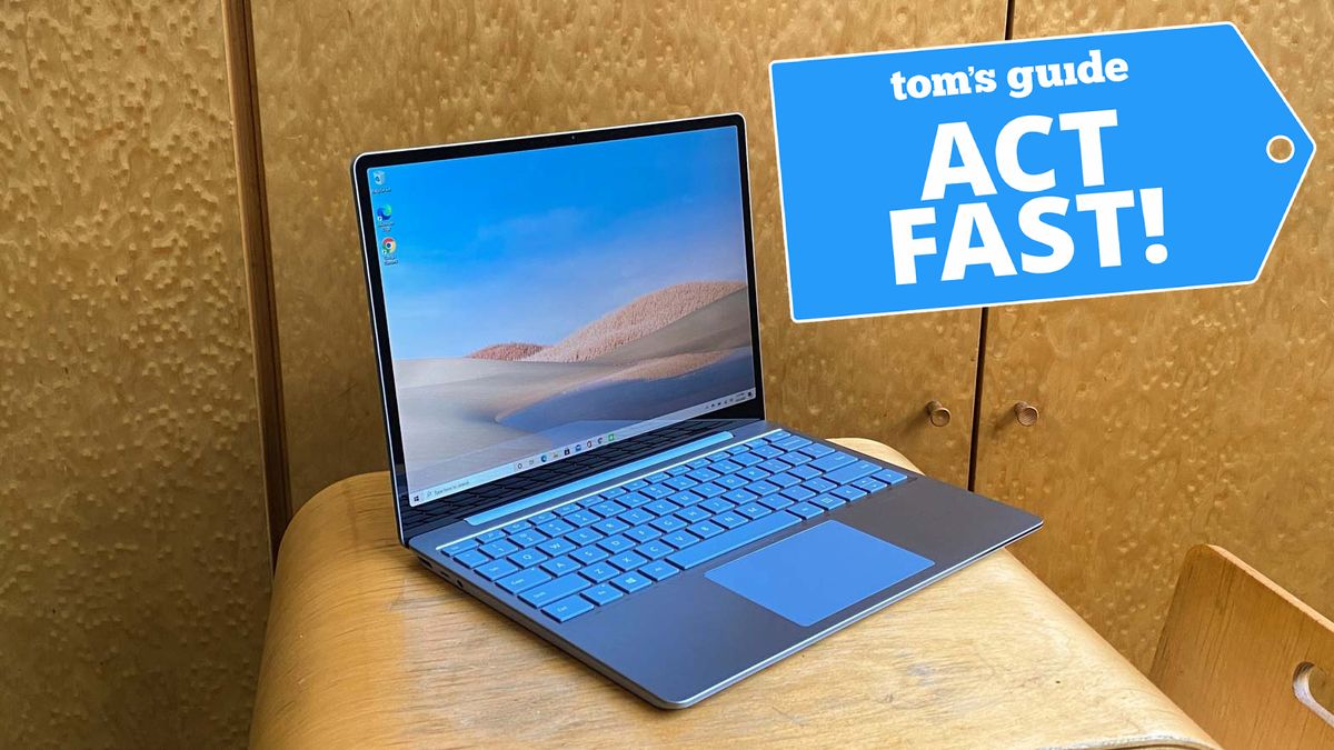 Microsoft Surface Laptop Go on a table with Black Friday deal image superimposed