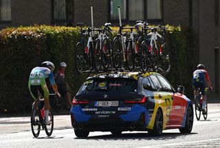 Jonathan Milan ordered to pull over as race leader is lapped by peloton following huge crash at Renewi Tour