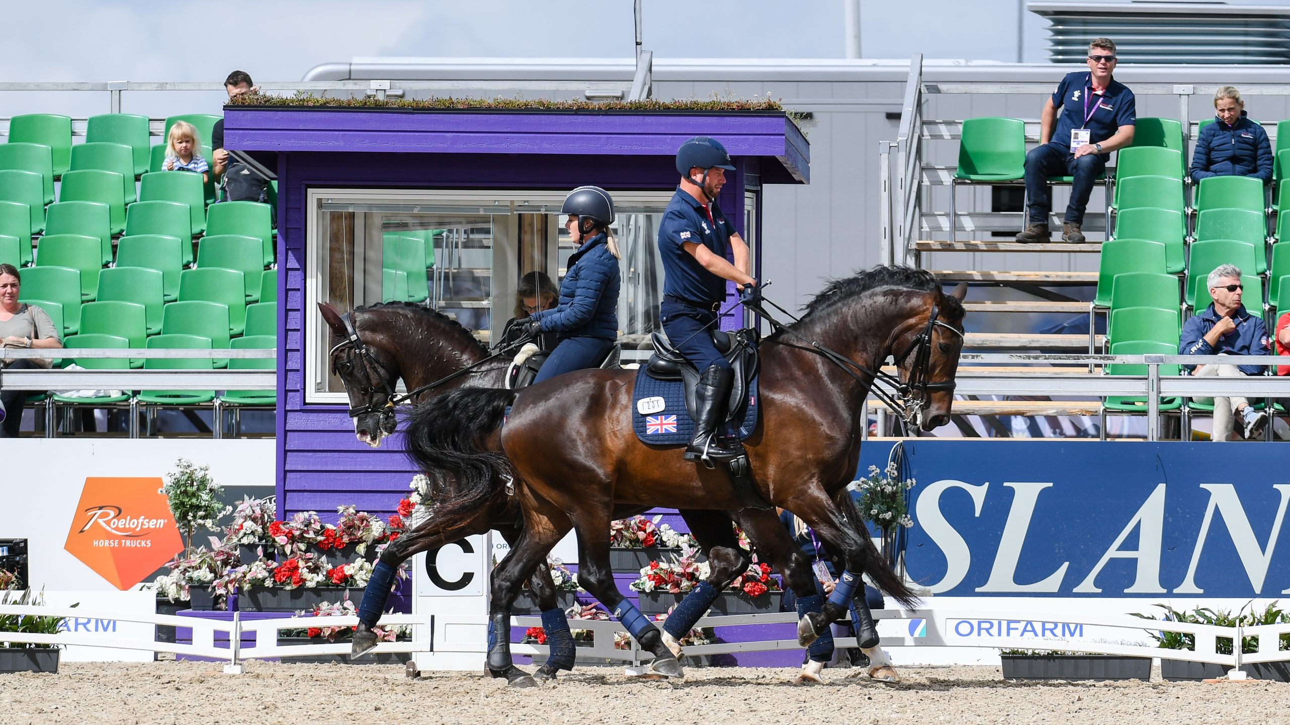 Para riders Sir Lee Pearson (Breezer) and Sophie Wells (Don Cara M) during arena familiarisation at the World Para Dressage Championships
