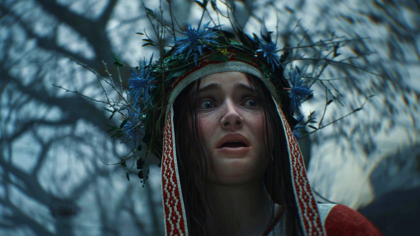 A close-up of a scared young girl&#039;s face as she stumbles through the woods, a crown of twigs and flowers upon her head.