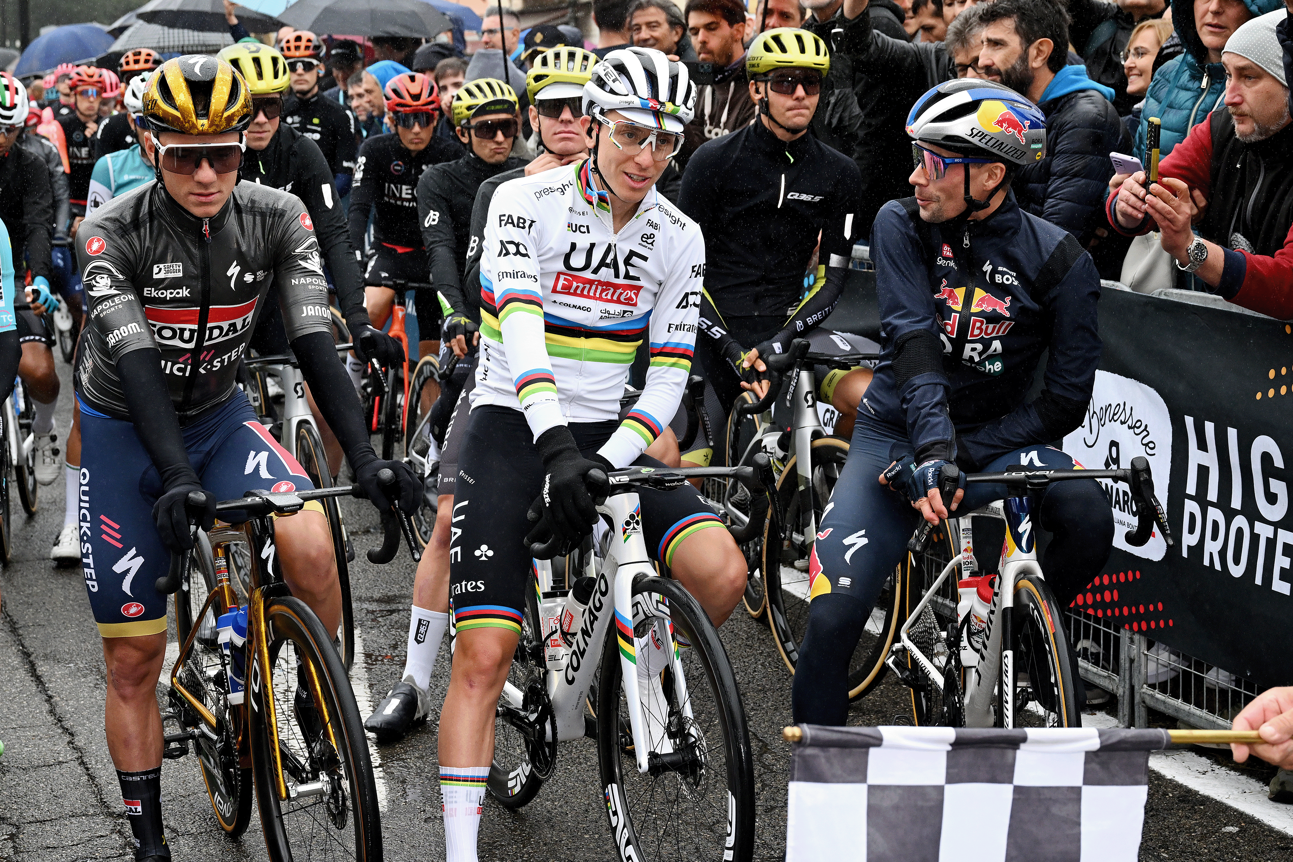 Primoz Roglič lined up next to Tadej Pogačar and on the other side, Remco Evenepoel