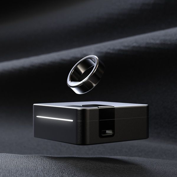 Ultrahuman Ring PRO in Aster Black with its charging case.