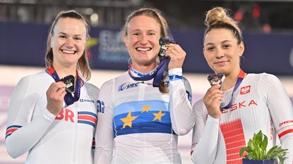 Team GB'sJess Roberts (left) celebrates her silver medal in the 2022 European Track Championships Scratch Race