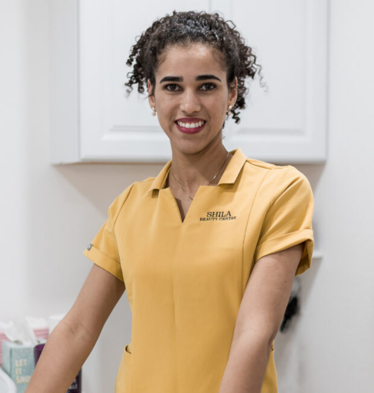 Shirlei Silva in a yellow shirt