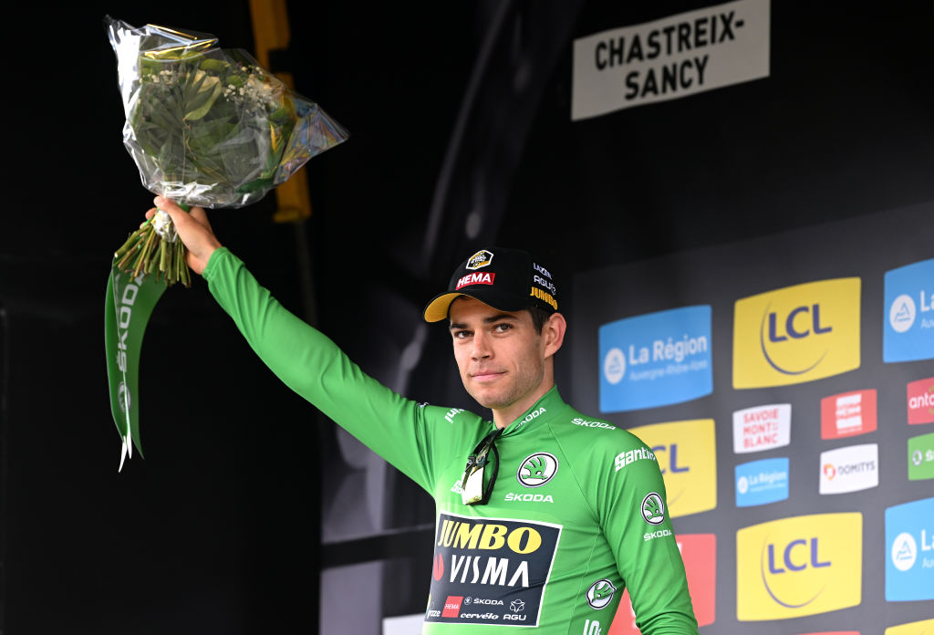CHASTREIXSANCY FRANCE JUNE 07 Wout Van Aert of Belgium and Team Jumbo Visma Green Points Jersey celebrates at podium during the 74th Criterium du Dauphine 2022 Stage 3 a 169km stage from SaintPaulien to ChastreixSancy 1391m WorldTour Dauphin on June 07 2022 in ChastreixSancy France Photo by Dario BelingheriGetty Images