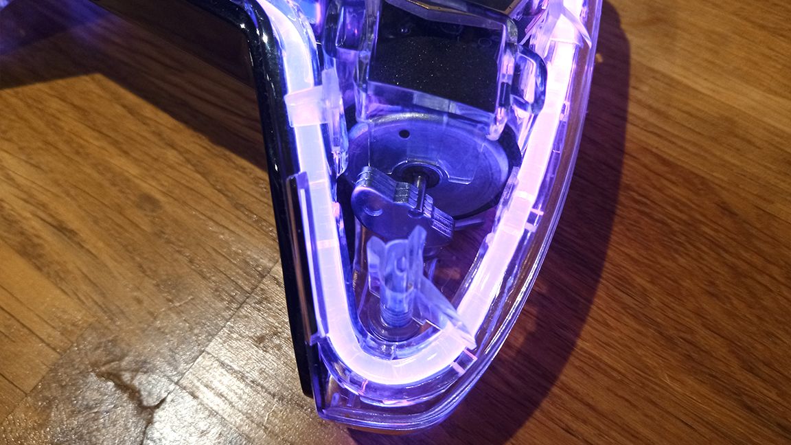 A photo of the BigBig Won Rainbow controller showing its internal rumble mechanics