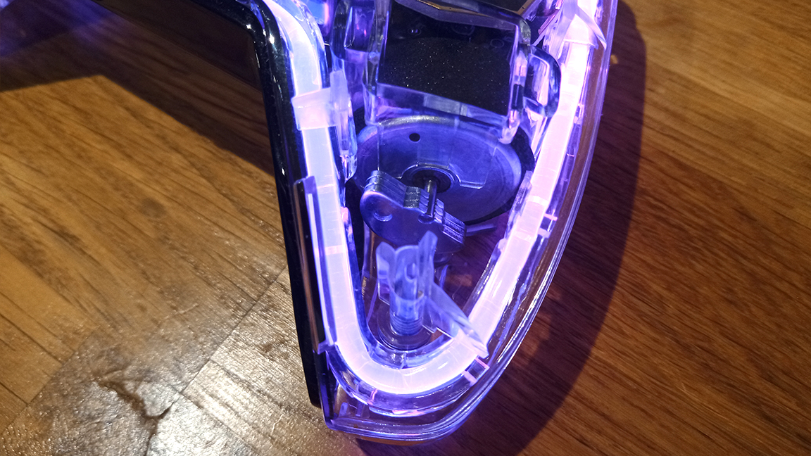 A photo of the BigBig Won Rainbow controller showing its internal rumble mechanics