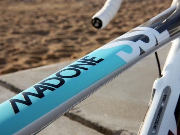 If you look carefully, you'll see that the 'Madone' decal is a little thick beneath the clear coat. Later team bikes will have thinner water transfer decals that will sit flatter on the tube surface.
