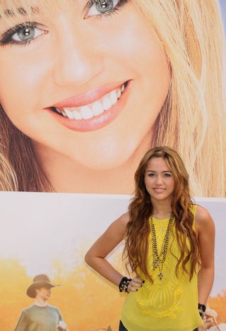 MADRID, SPAIN - APRIL 22: Actress Miley Cyrus attends 'Hannah Montana:The Movie' photocall at the Villamagna Hotel on April 22, 2009 in Madrid, Spain (Photo by Carlos Alvarez/Getty Images)