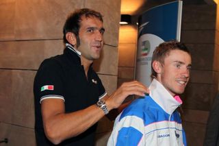 A relaxed looking Italian coach Franco Ballerini with his team's leader Damiano Cunego