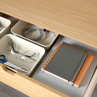 Inside oak desk drawer