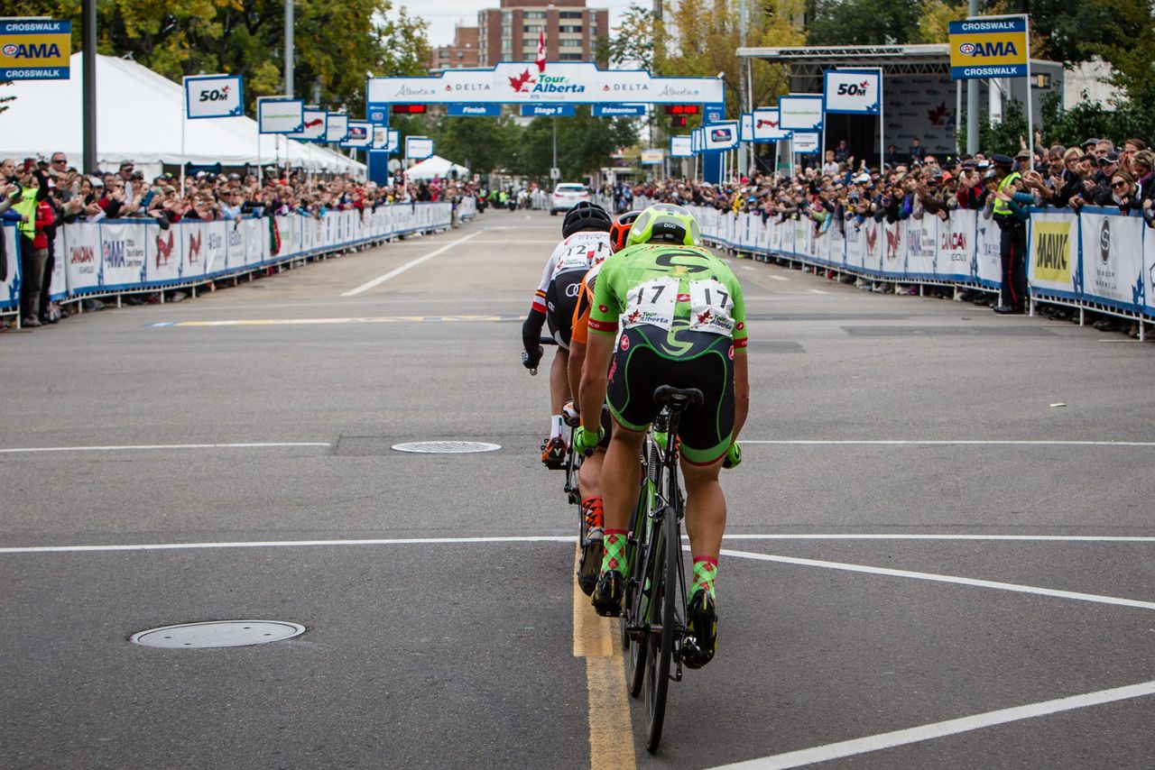 The late break passes through the finish with one lap to go.