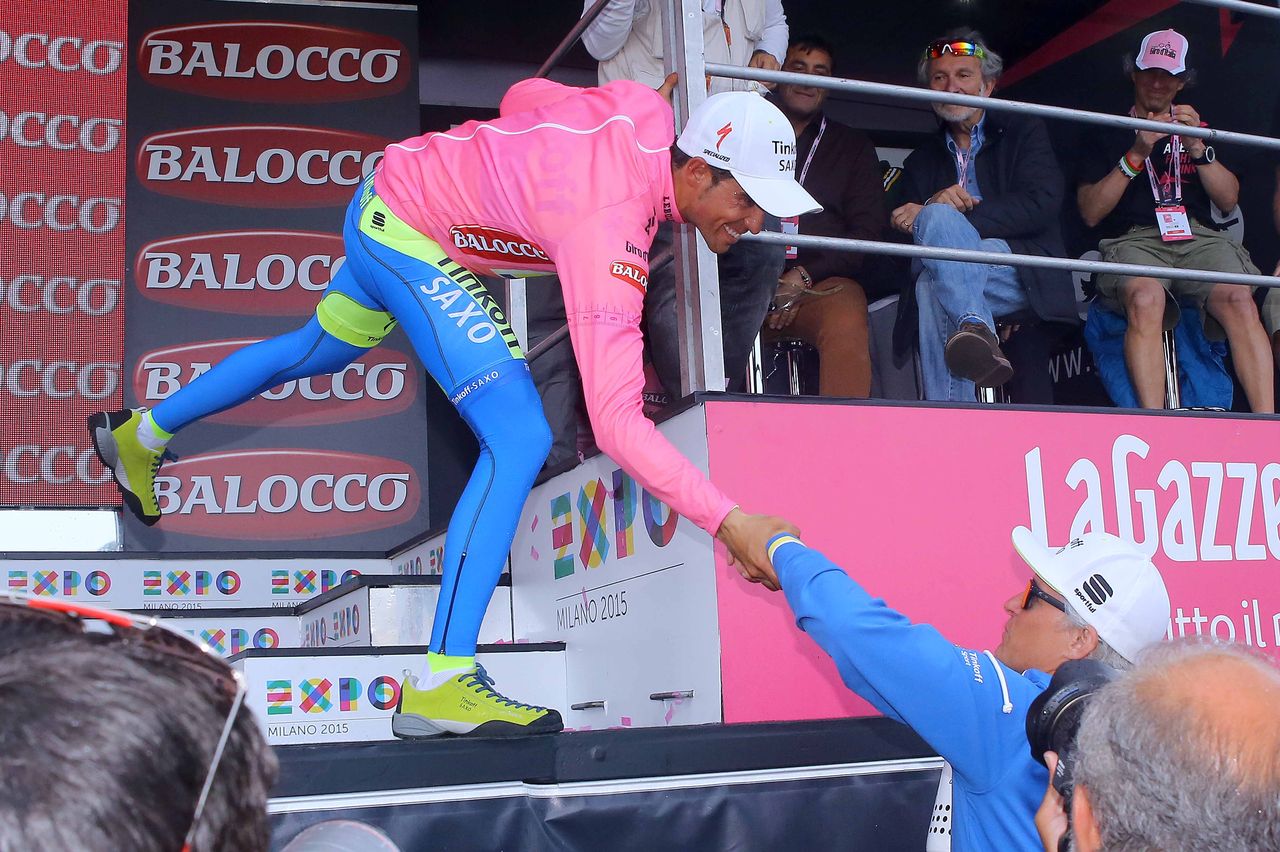 Alberto Contador and team owner Oleg Tinkov celebrate the pink jersey