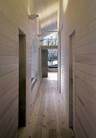 Walkway hall interior with wooden wall and floor finishing