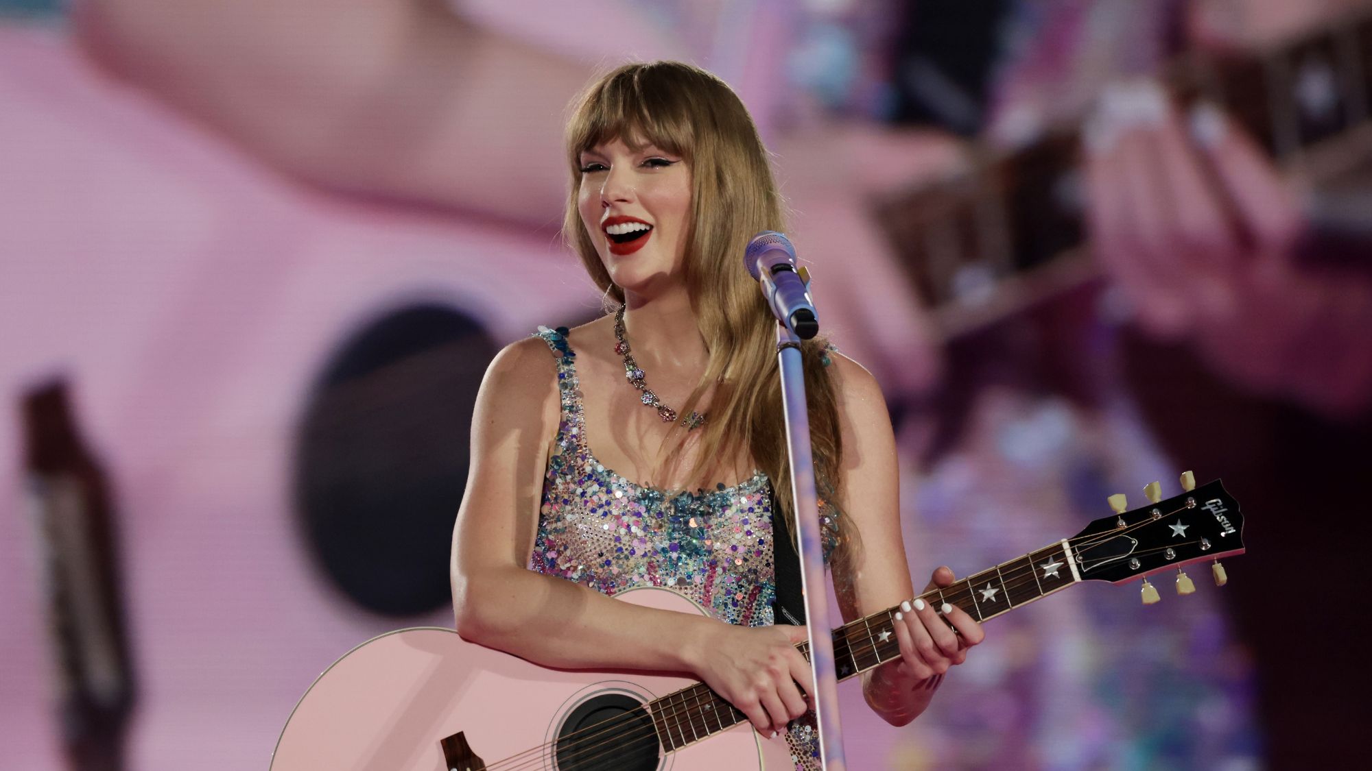 Taylor Swift performing on stage during her Eras Tour