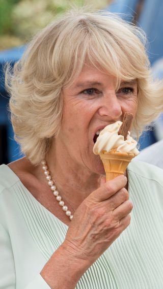 Camilla eating an ice cream.