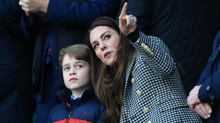 Catherine, Duchess of Cambridge speaks to Prince George prior to a Guinness Six Nations Rugby match