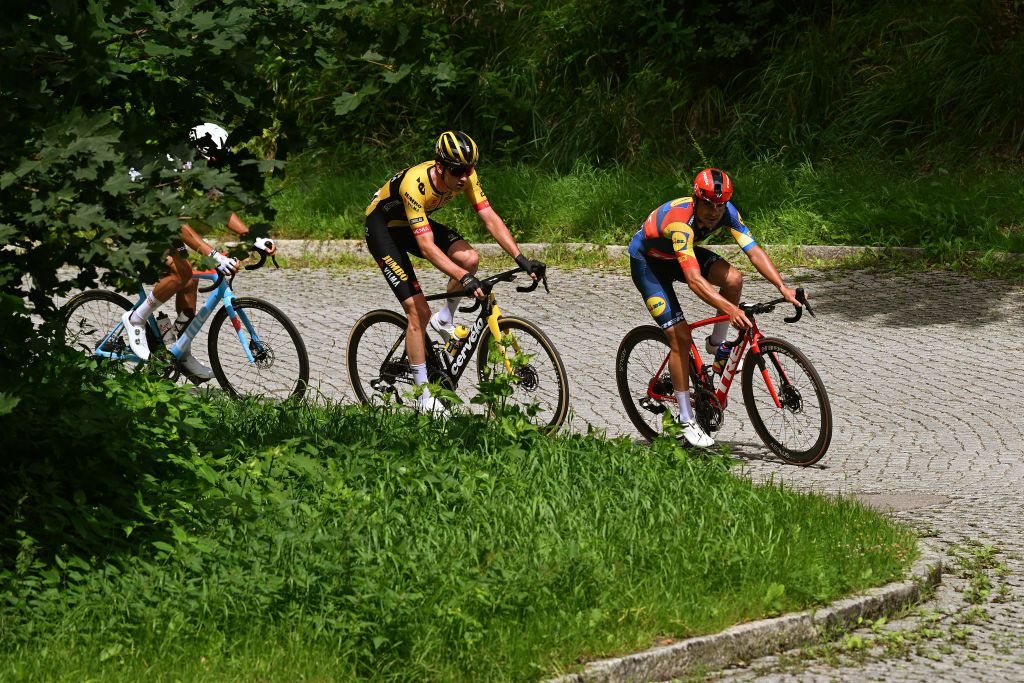 DUSZNIKIZDROJ POLAND JULY 31 LR Mick Van Dijke of The Netherlands and Team JumboVisma and Jacopo Mosca of Italy and Team Lidl Trek compete in the breakaway during the 80th Tour de Pologne 2023 Stage 3 a 1623km stage from Walbrzych to DusznikiZdroj 668m UCIWT on July 31 2023 in DusznikiZdroj Poland Photo by Dario BelingheriGetty Images