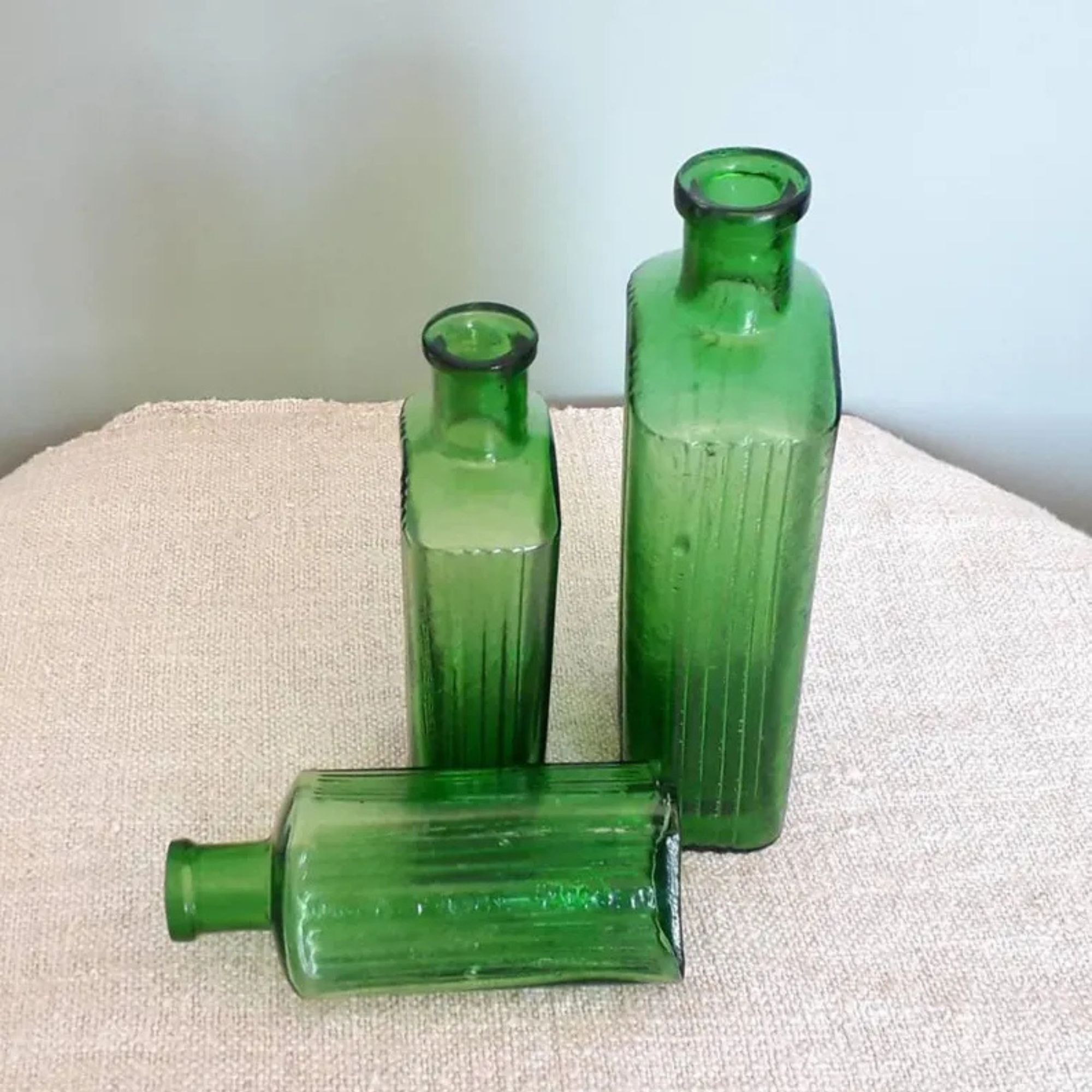 Old green glass pharmacy bottle