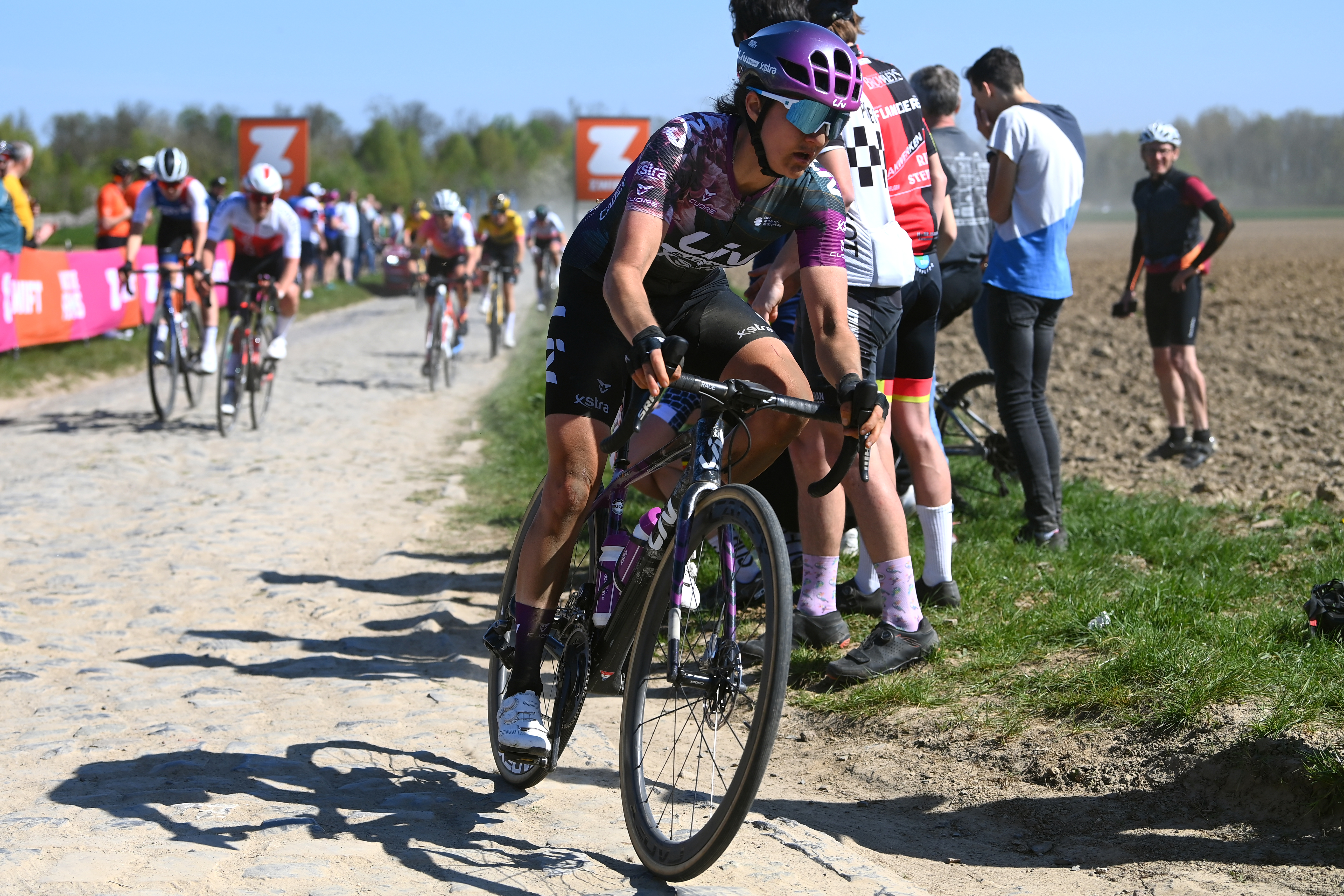 ROUBAIX, FRANCE - APRIL 16: Valerie Demey of Belgium and Team Liv Racing Xstra competes passing through a cobblestones sector during the 2nd Paris-Roubaix 2022 - Women&amp;amp;apos;s Elite a 124,7km one day race from Denain to Roubaix / #ParisRoubaixFemmes / #ParisRoubaix / on April 16, 2022 in Roubaix, France. (Photo by Tim de Waele/Getty Images)