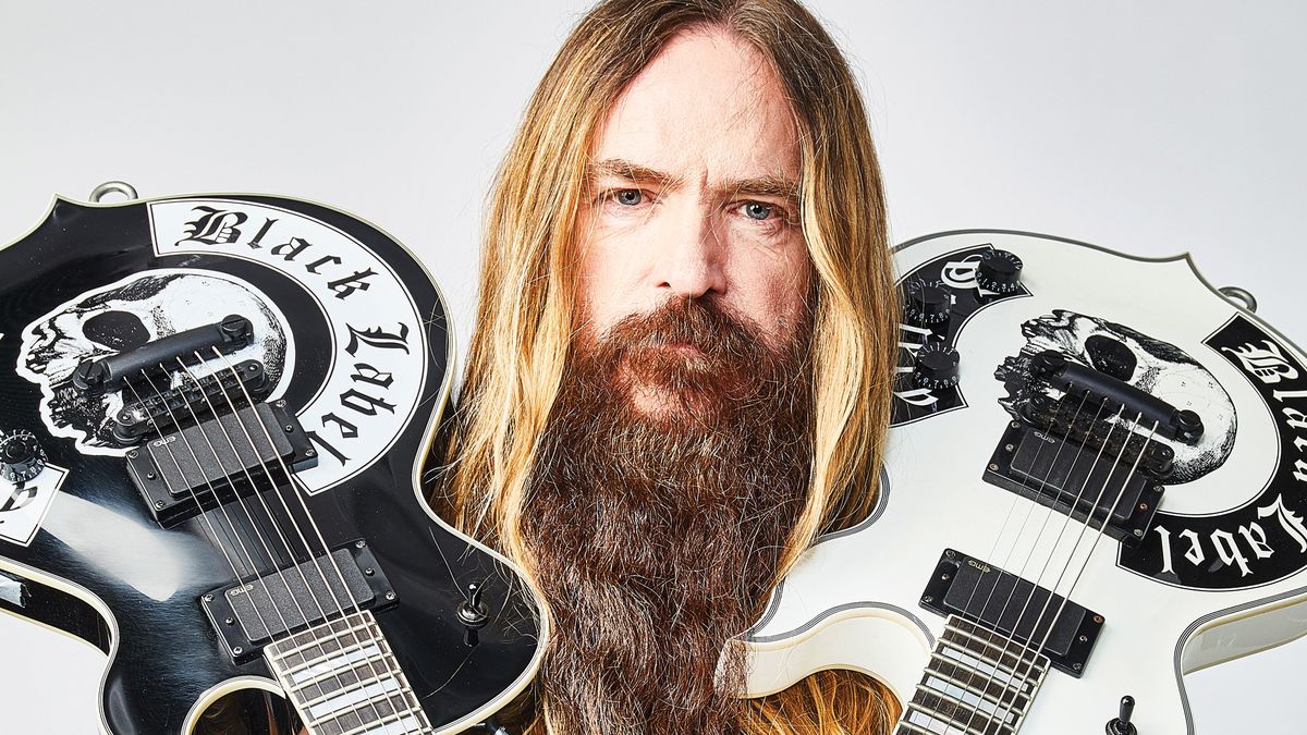 Zakk Wylde poses with guitars