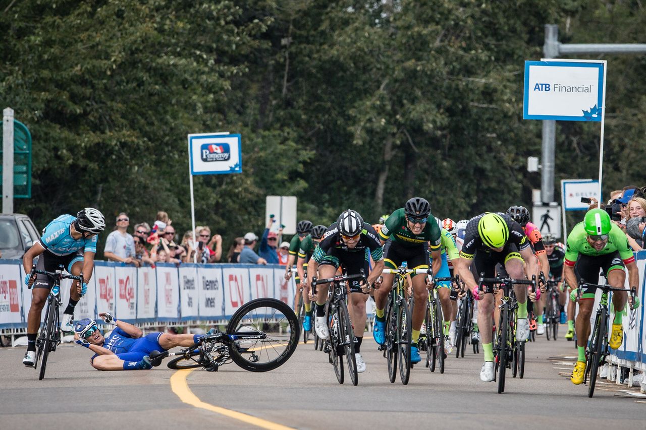 Travis McCabe hits the deck in a crash during stage 2 at the Tour of Alberta