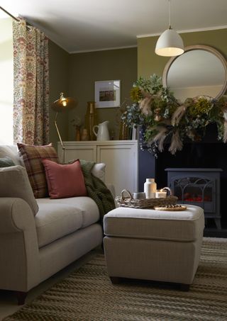 fall living room with foraged mantlepiece decoration