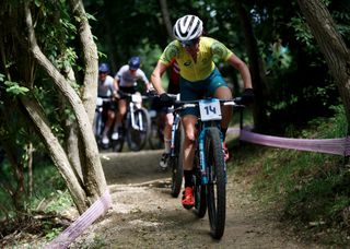 ELANCOURT FRANCE JULY 28 Rebecca Henderson of Team Australia competes during the Womens CrossCountry Cycling Mountain Bike Gold Medal race on day two of the Olympic Games Paris 2024 at Elancourt Hill on July 28 2024 in Elancourt France Photo by Jared C TiltonGetty Images