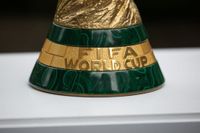 The FIFA World Cup trophy is displayed during an event in New York after an announcement related to the staging of the FIFA World Cup 2026, on June 16, 2022. Mexico City's iconic Azteca Stadium and the Los Angeles Rams' multi-billion-dollar SoFi Stadium were among 16 venues named on June 16 to stage games at the 2026 World Cup being held in the United States, Canada and Mexico. (Photo by Yuki IWAMURA / AFP)