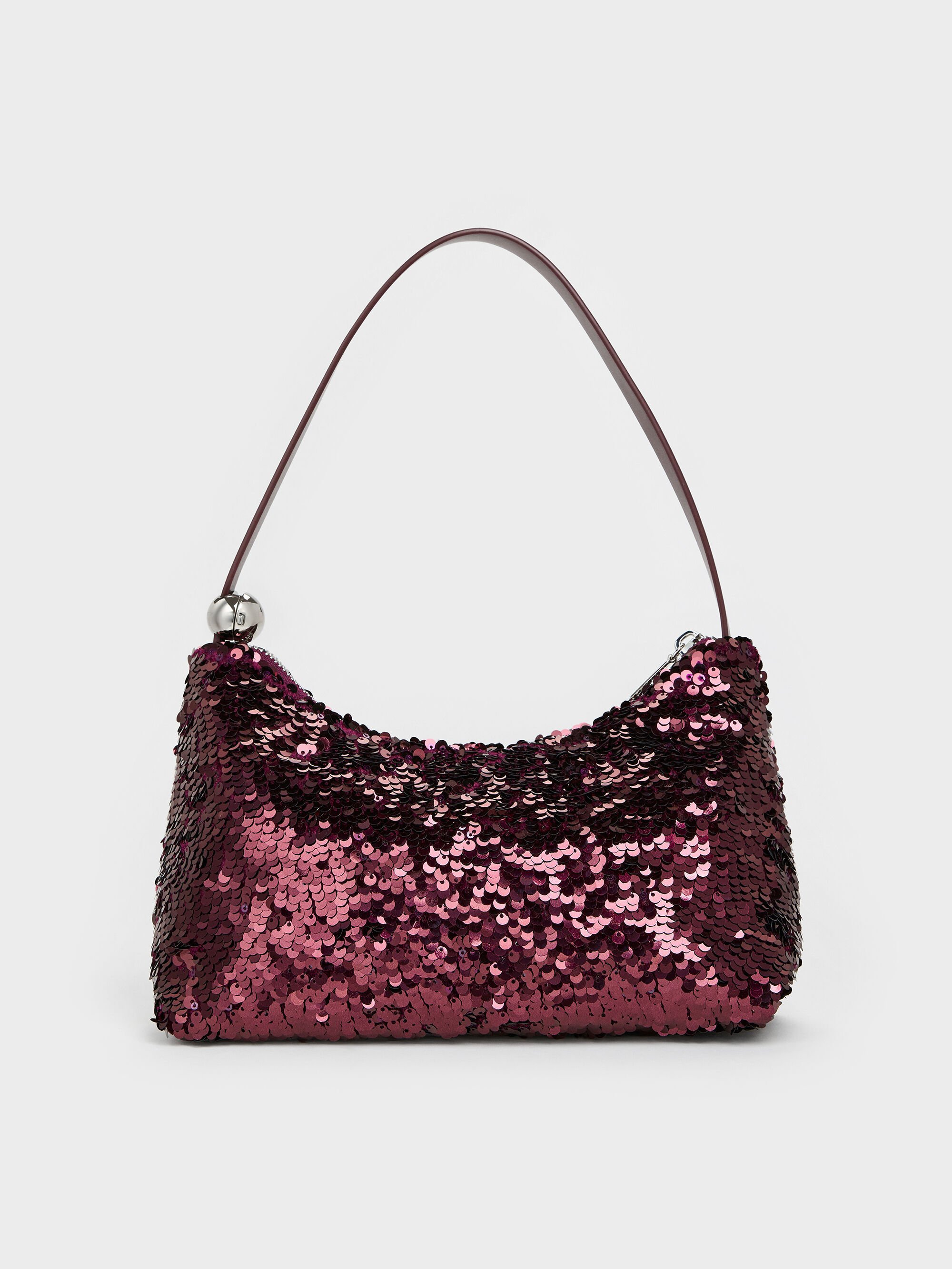 a burgundy sequin bag from Charles &amp;amp; Keith