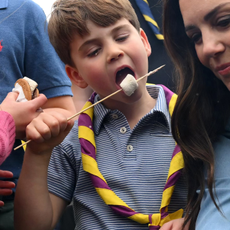 Prince Louis of Wales and Catherine, Princess of Wales toast marshmallows as they take part in the Big Help Out, during a visit to the 3rd Upton Scouts Hut in Slough on May 8, 2023 in London, England. The Big Help Out is a day when people are encouraged to volunteer in their communities. It is part of the celebrations of the Coronation of Charles III and his wife, Camilla, as King and Queen of the United Kingdom of Great Britain and Northern Ireland, and the other Commonwealth realms that took place at Westminster Abbey on Saturday, May 6, 2023.