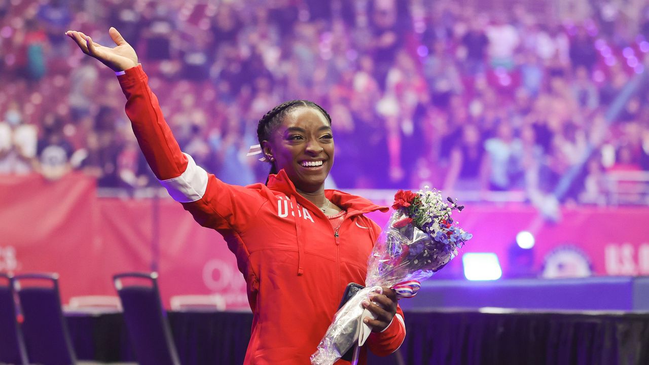 st louis, missouri june 27 simone biles waves to the crowd as she exits following the womens competition of the 2021 us gymnastics olympic trials at america’s center on june 27, 2021 in st louis, missouri photo by carmen mandatogetty images