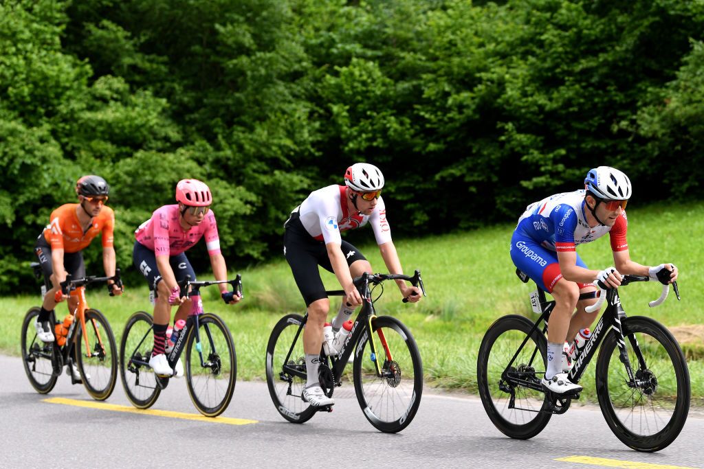 GSTAAD SWITZERLAND JUNE 09 Joey Rosskopf of United States and Team Rally Cycling Stefan Bissegger of Switzerland and Team EF Education Nippo Joel Suter of Switzerland and Team Switzerland Benjamin Thomas of France and Team Groupama FDJ in the Breakaway during the 84th Tour de Suisse 2021 Stage 4 a 171km stage from St Urbanto Gstaad 1004m UCIworldtour tds tourdesuisse on June 09 2021 in Gstaad Switzerland Photo by Tim de WaeleGetty Images