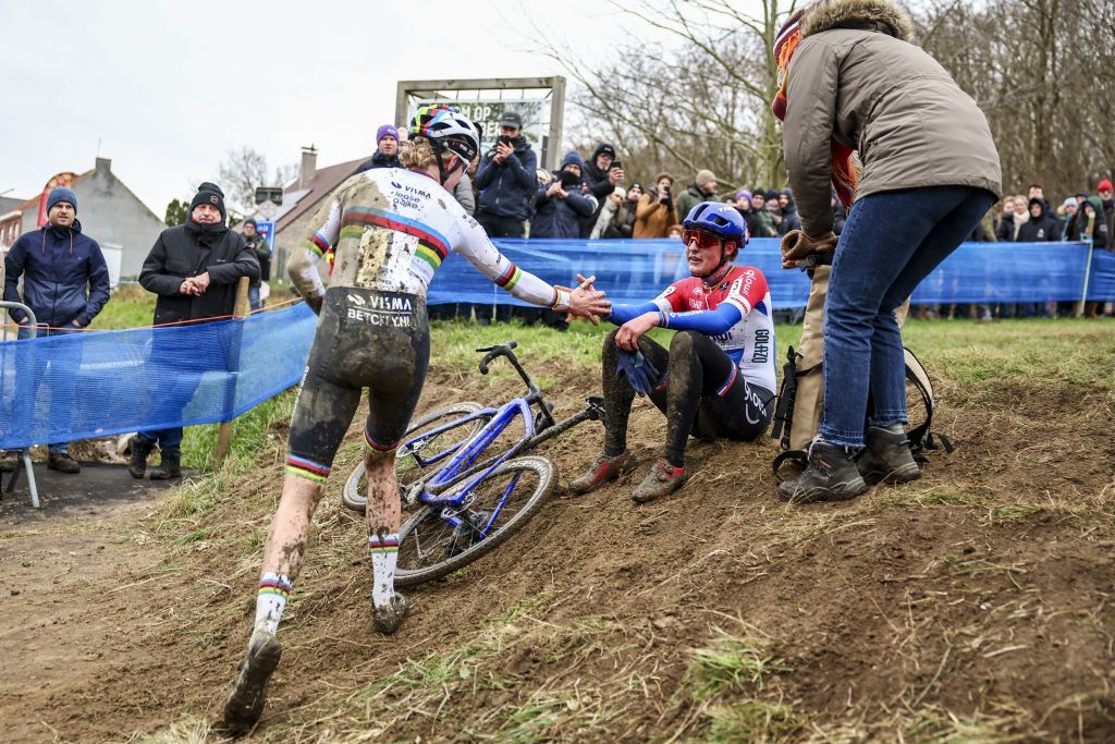 Winner Dutch Fem Van Empel and Dutch Lucinda Brand pictured after the women's elite race of the 'GP Sven Nys' cyclocross cycling event on Wednesday 01 January 2025 in Baal, stage 5/8 in the X2O Badkamers 'Trofee Veldrijden' competition. BELGA PHOTO DAVID PINTENS (Photo by DAVID PINTENS / BELGA MAG / Belga via AFP)
