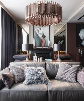 grand luxury living room with grey sofa and large pendant light