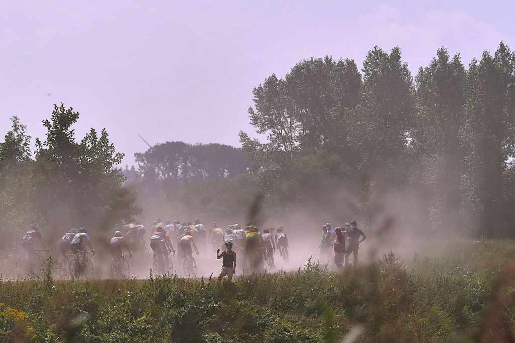 DIEST BELGIUM AUGUST 15 Peloton Dust Gravel Strokes Landscape during the 17th Dwars door het Hageland 2020 a 187km race from Aarschot to Diest DwarsdhHageland DDHH20 on August 15 2020 in Diest Belgium Photo by Luc ClaessenGetty Images