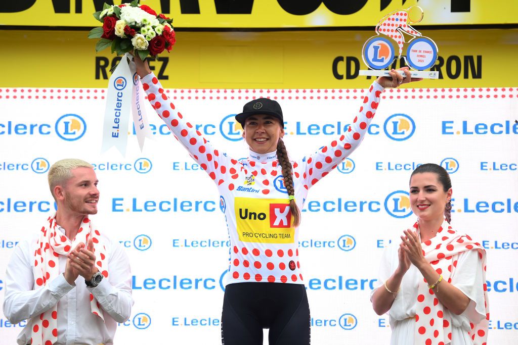 RODEZ FRANCE JULY 26 Anouska Koster of The Netherlands and Team UnoX Pro Cycling Team celebrates at podium as Polka Dot Mountain Jersey winner during the 2nd Tour de France Femmes 2023 Stage 4 a 1771km stage from Cahors to Rodez 572m UCIWWT on July 26 2023 in Rodez France Photo by Alex BroadwayGetty Images