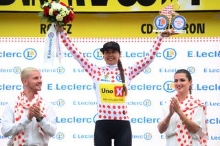 RODEZ FRANCE JULY 26 Anouska Koster of The Netherlands and Team UnoX Pro Cycling Team celebrates at podium as Polka Dot Mountain Jersey winner during the 2nd Tour de France Femmes 2023 Stage 4 a 1771km stage from Cahors to Rodez 572m UCIWWT on July 26 2023 in Rodez France Photo by Alex BroadwayGetty Images