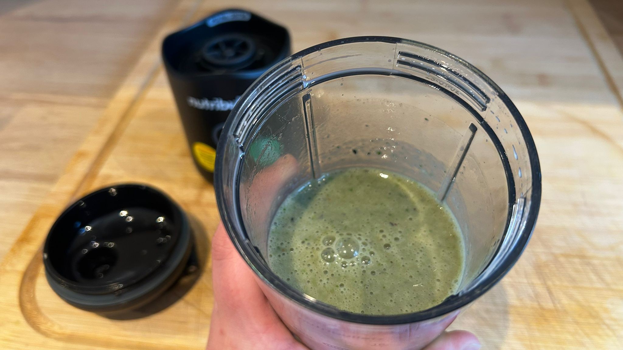Nutribullet Flex blender containing banana kale smoothie