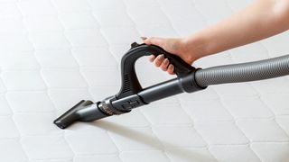 Vacuum cleaning a mattress
