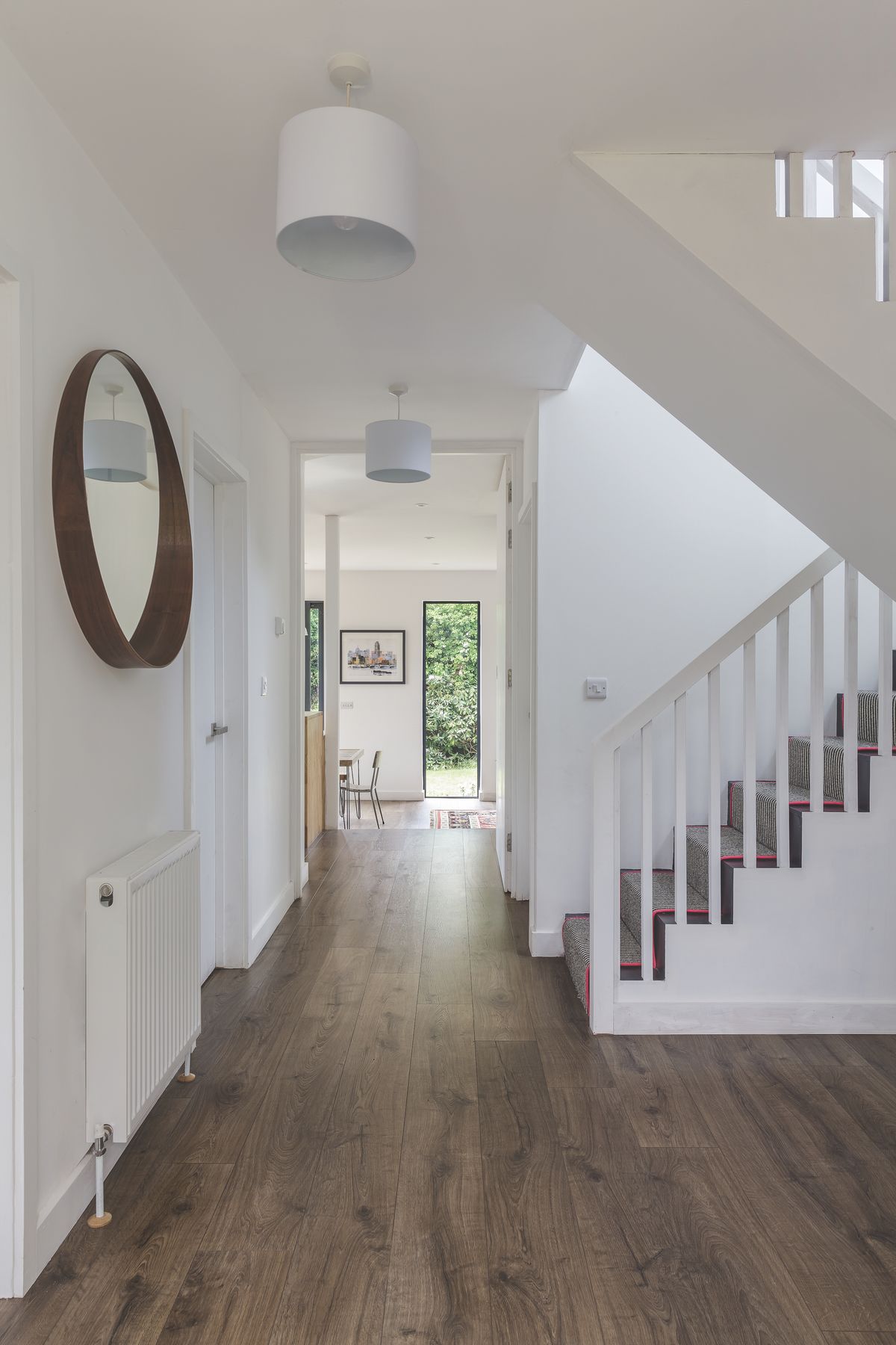 Will wanted a visual connection right through the house to the garden as you walked in the front door. He achieved this by removing an internal wall and by adding a tall narrow window overlooking the garden.