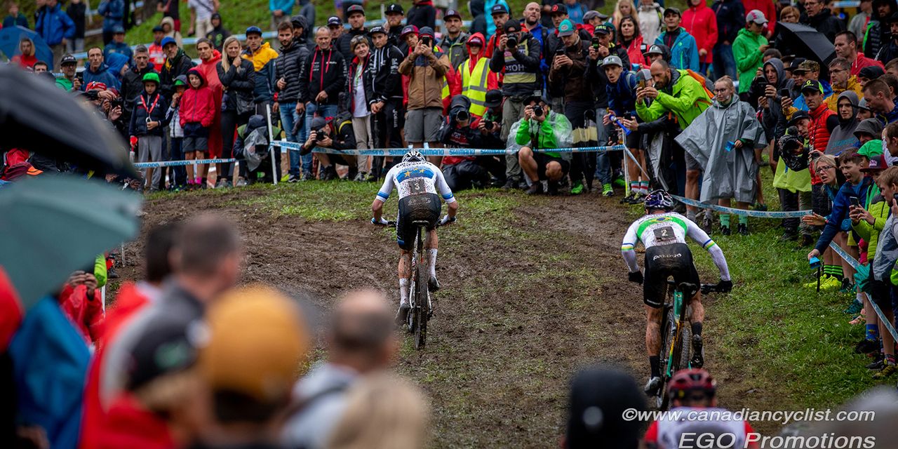 Mathieu van der Poel (Corendon-Circus) being chased by Henrique Avancini (Cannondale Factory Racing).